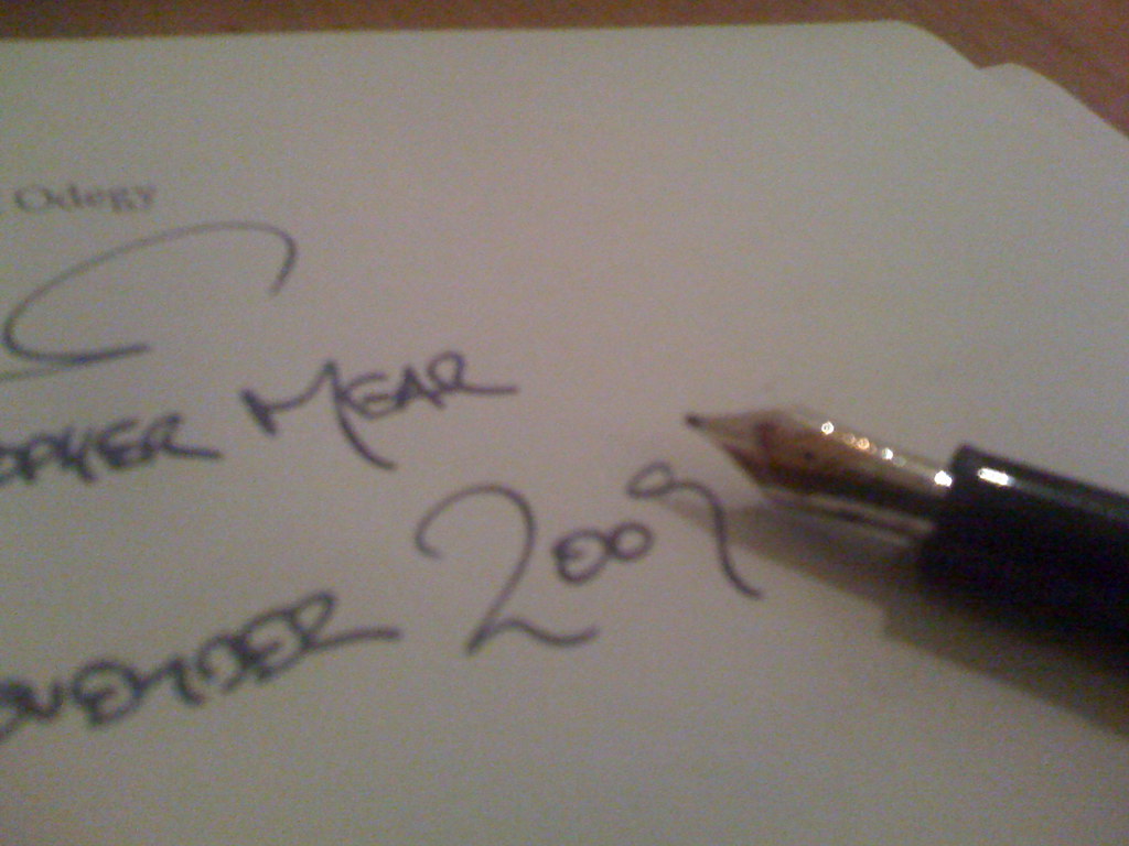 Signing a vehicle sale contract for the transfer certificate