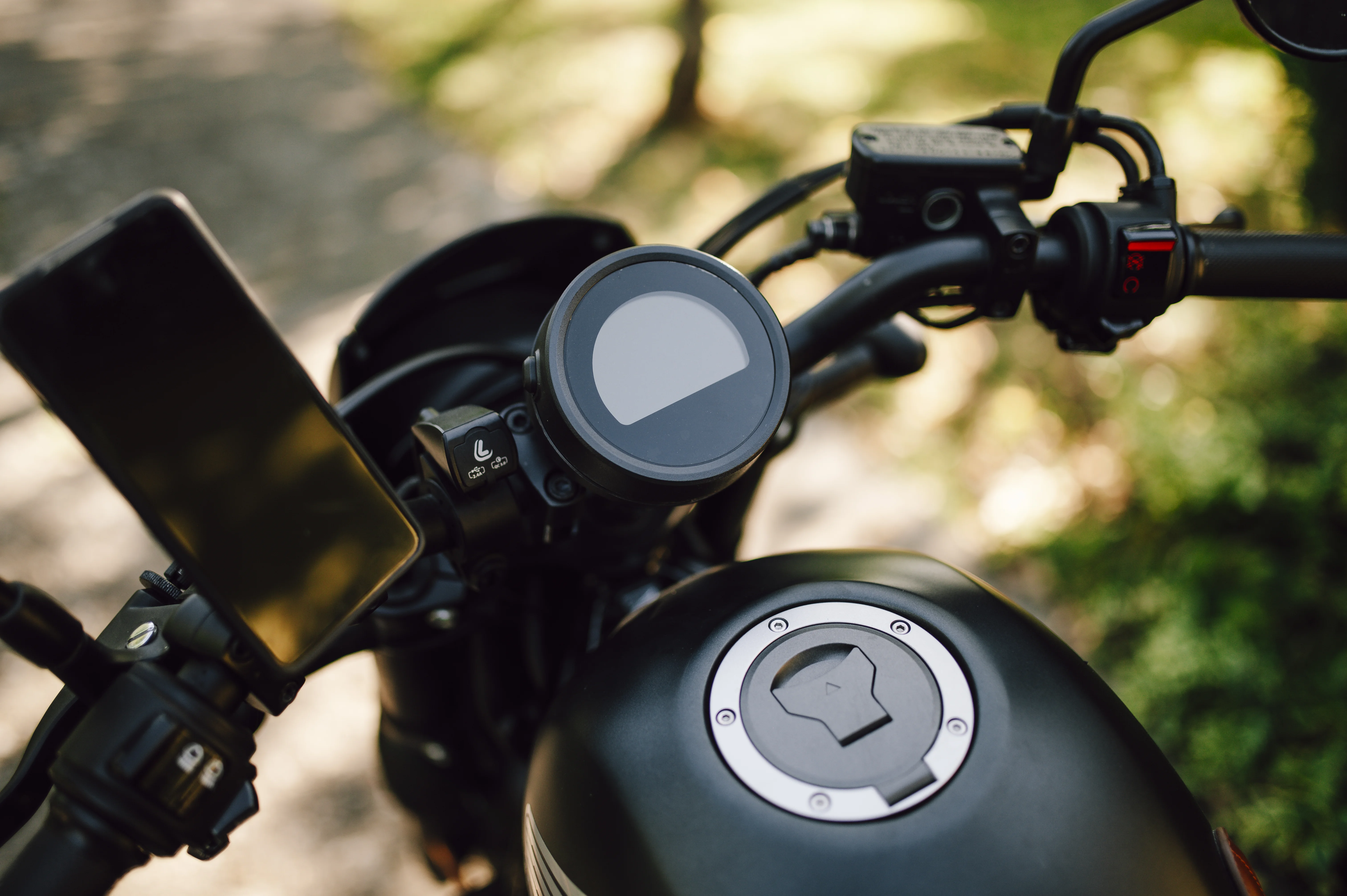 Motorcycle dashboard, comparing two-wheeler insurance quotes